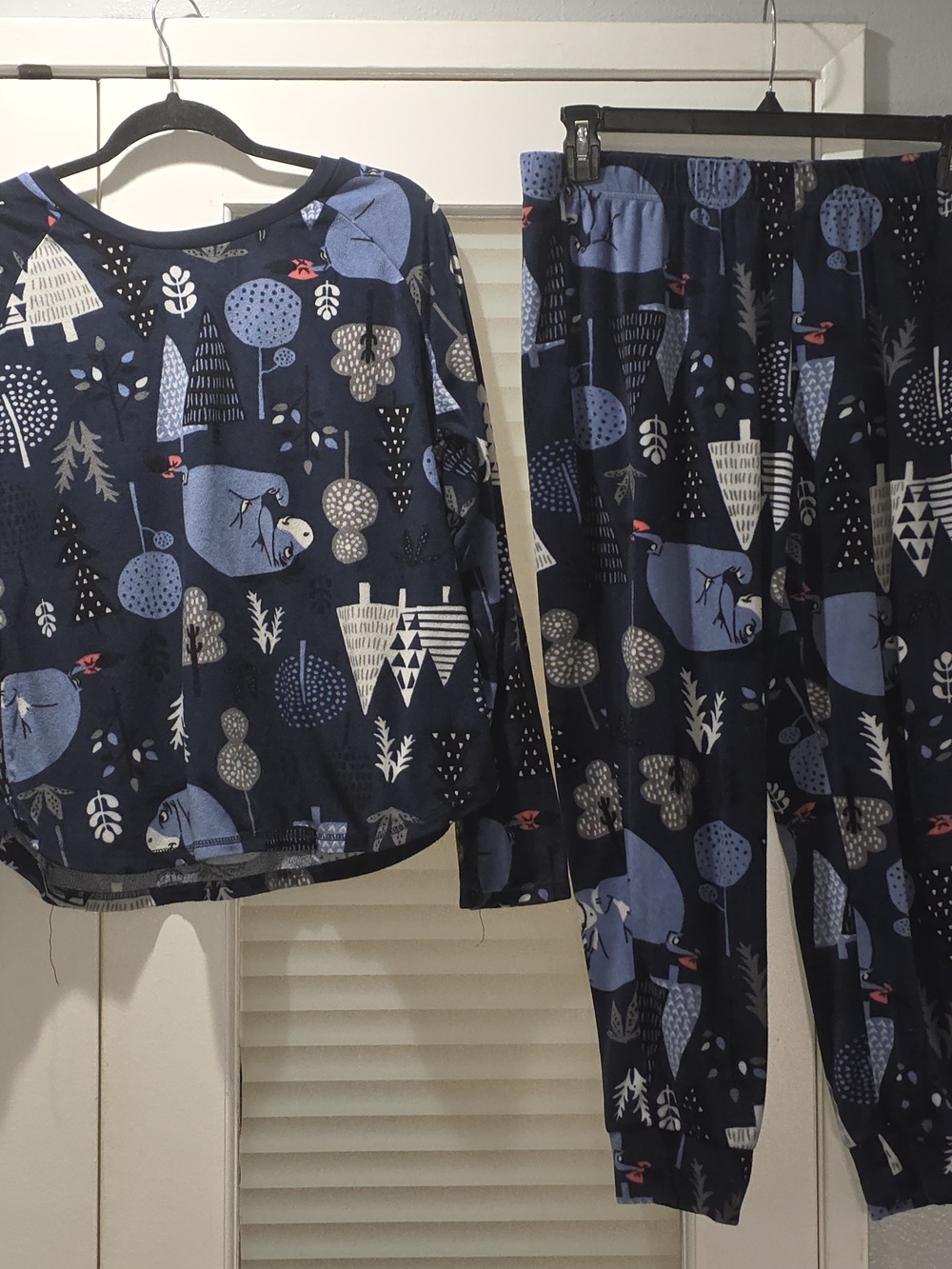 Disney Winnie the Pooh Eeyore navy blue pajama set features a whimsical characte